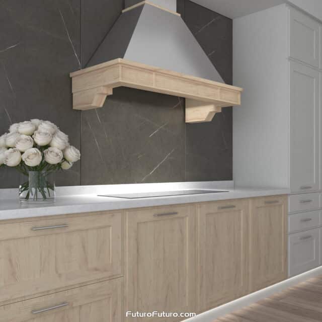 Unstained wooden frame of the 48-inch Sphinx Wall Range Hood, customizable to suit your kitchen design.