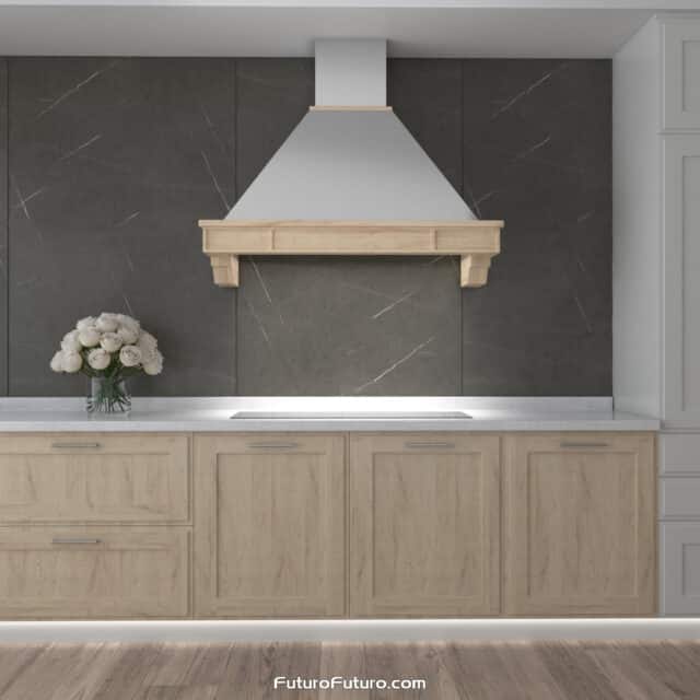 48-inch Sphinx Range Hood offering a blend of stainless steel and wood aesthetics.