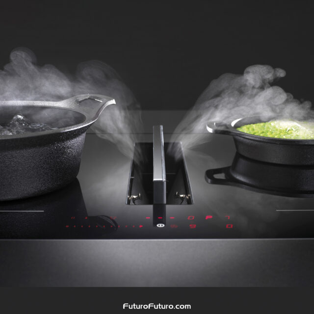 Kitchen counter showcasing fresh ingredients like parsley, lime, and cherry tomatoes near an induction range.