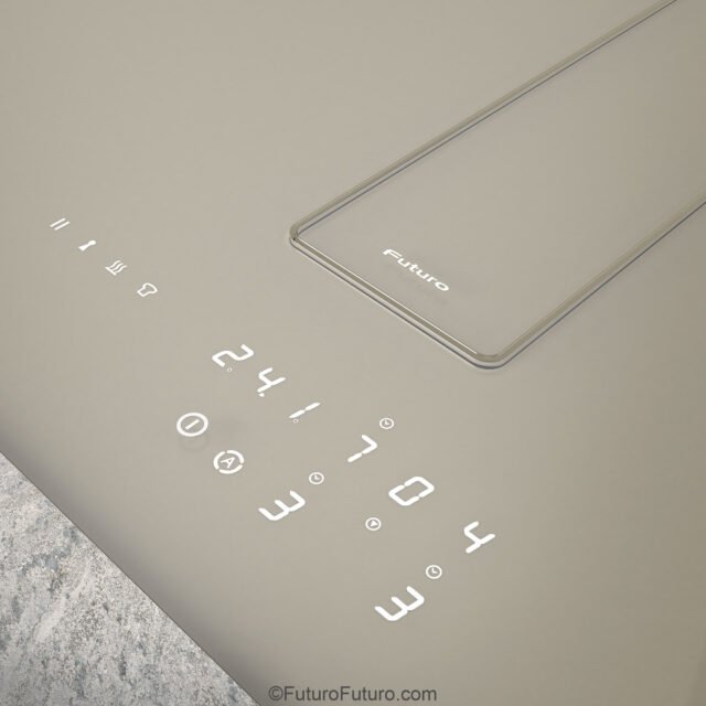 Compact downdraft ventilation system integrated into cooktop design
