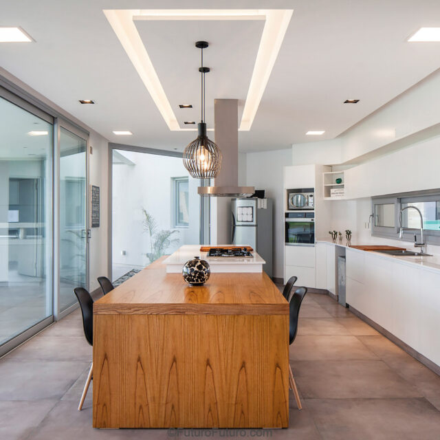 Island-mounted Positano hood with elegant design