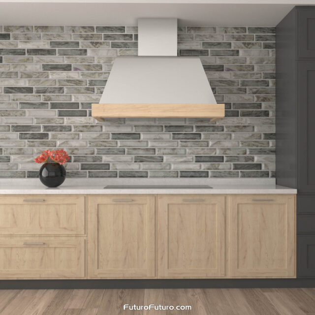 The modern design of the Futuro Futuro 48-inch Cascade Wall Range Hood in a traditional kitchen.