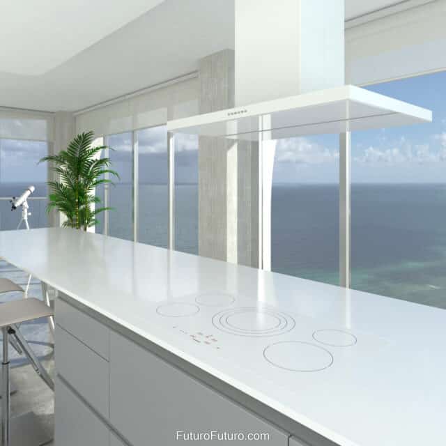 A modern kitchen enhanced by the Futuro Futuro Viale White 36-inch Island Range Hood